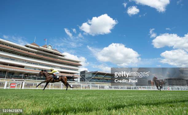 Jockey Andrea Atzeni riding Lord Campari on their way to win the Its Not Rocket Science with MansionBet Novice Stakes at Newbury Racecourse on June...