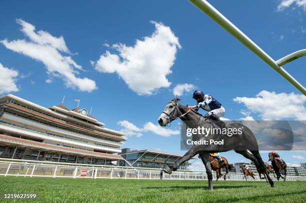 Jockey Ryan Moore riding Edmond Dantes approach the finish line to win the MansionBet Proud to Support British Racing Handicap Stakes at Newbury...