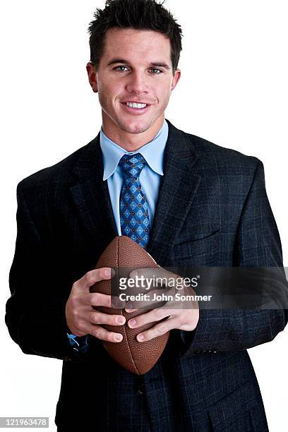 football player wearing a suit - american football professional player not soccer stock pictures, royalty-free photos & images