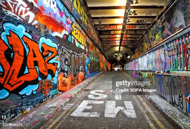Entrance to the famous Leake Street tunnel covered with street art. Black Lives Matter related Street Art at the famous Leake Street Tunnel under...