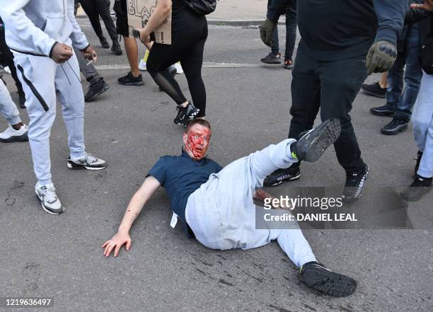 Fights take place near Waterloo Station as protesters supporting the Black Lives Matter movement clash with opponents in central London on June 13 in...