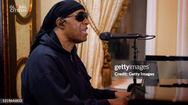 In this screengrab, Stevie Wonder performs during "One World: Together At Home" presented by Global Citizen on April 2020. The global broadcast and...