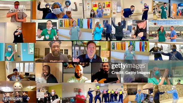 In this screengrab, Jimmy Fallon sings with musical group The Roots and frontline medical Workers during "One World: Together At Home" presented by...