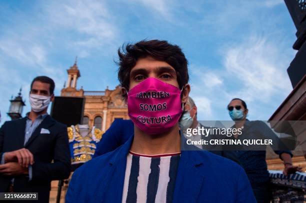 French matador Sebastian Castella wears a face mask reading "We are also culture" during a demonstration demanding more resources for the...
