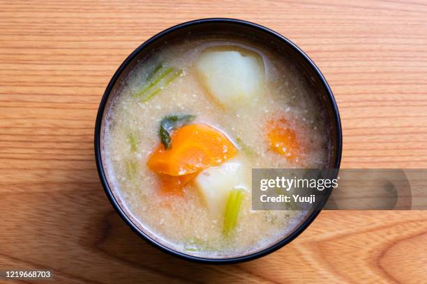 miso soup with potatoes and carrots - miso soup stock pictures, royalty-free photos & images