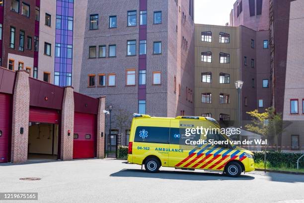 Ambulance arriving at the emergency room of the Isala hospital on April 18, 2020 in Zwolle, Netherlands. Instead of adopting a hard lockdown similar...
