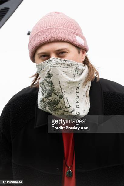 Lucas Grabeel wears a protective mask while walking around Koreatown during the coronavirus Covid-19 pandemic on April 18, 2020 in Los Angeles,...