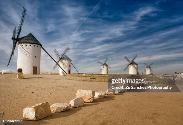 windmills of la mancha - campo de criptana stockfoto's en -beelden
