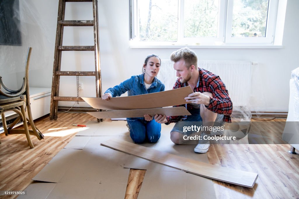Young couple improving their home.