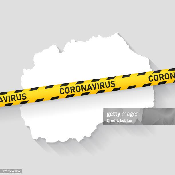 north macedonia map with coronavirus caution tape. covid-19 outbreak - skopje stock illustrations