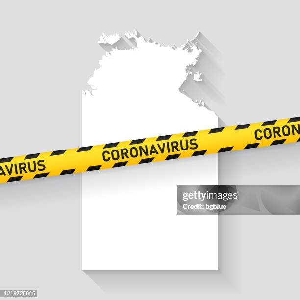 northern territory map with coronavirus caution tape. covid-19 outbreak - darwin lockdown stock illustrations