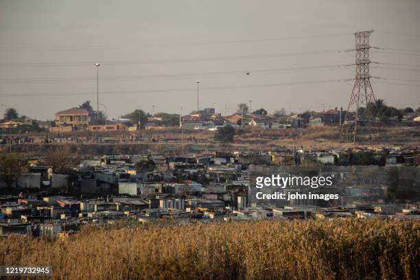 view of a south african township in soweto - soweto stock-fotos und bilder