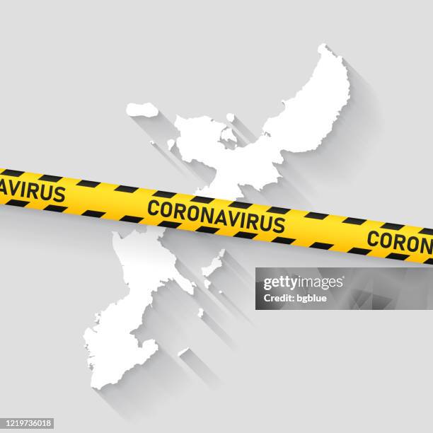 okinawa island map with coronavirus caution tape. covid-19 outbreak - okinawa prefecture stock illustrations