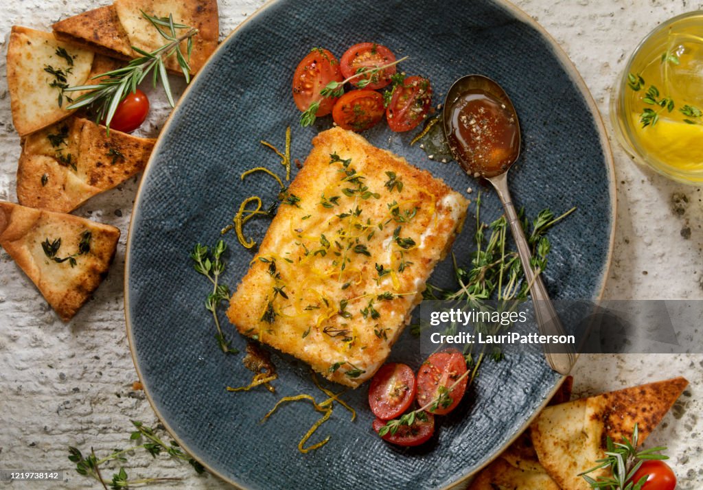 Breaded, Pan Fried Feta Cheese (Saganaki) with Peppered Honey and Baked Pita Chips