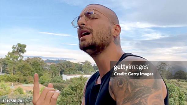 In this screengrab, Maluma performs during "One World: Together At Home" presented by Global Citizen on April 2020. The global broadcast and digital...