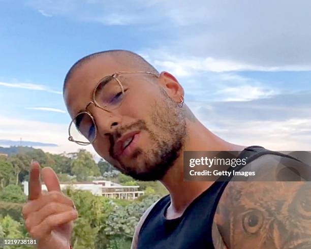 In this screengrab, Maluma performs during "One World: Together At Home" presented by Global Citizen on April 2020. The global broadcast and digital...