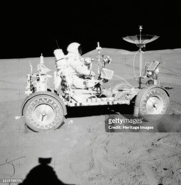 Apollo 15 Astronaut David R. Scott, commander, seated in the Lunar Roving Vehicle during the first Apollo 15 lunar surface extravehicular activity at...