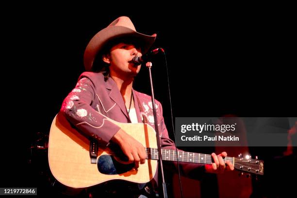 American Country musician Dwight Yoakam performs onstage at the Chicago Theater, Chicago, Illinois, August 5, 1988.