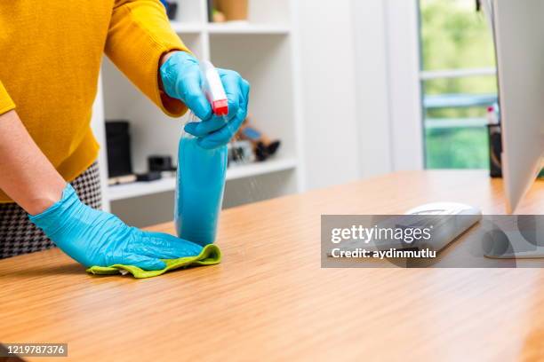 female janitor cleaning office - luva para lavar louça imagens e fotografias de stock