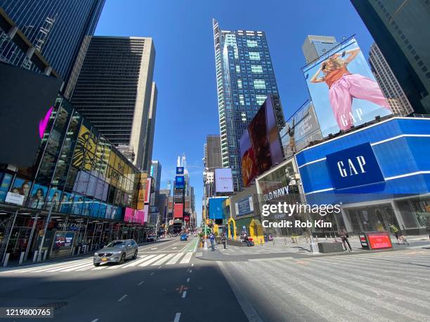 View of Times Square during the coronavirus pandemic on April 19, 2020 in New York City. Shelter-In-Place and social distancing continues across the...