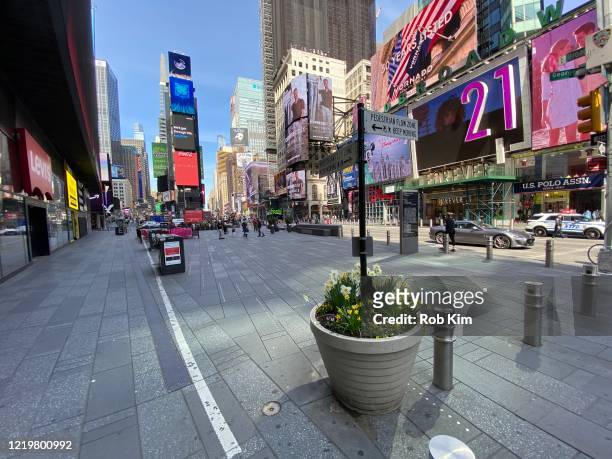 View of Times Square during the coronavirus pandemic on April 19, 2020 in New York City. Shelter-In-Place and social distancing continues across the...