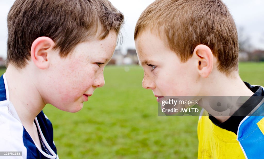 Football opponents face to face