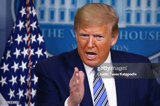 President Donald Trump takes questions at the daily coronavirus briefing at the White House on April 19, 2020 in Washington, DC. New York state will...