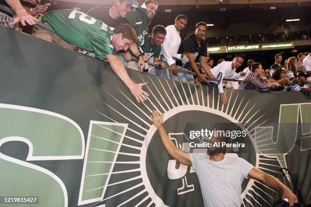 The Rapper Common attends the New York Jets vs Philadelphia Eagles game at The Meadowlands on September 3, 2009 in East Rutherford, New Jersey.