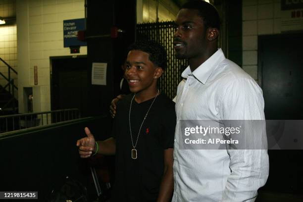 Justin Dior Combs meets with Philadelphia Eagles Quarterback Michael Vick when he attends the New York Jets vs Philadelphia Eagles game at The...