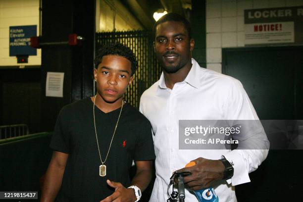 Justin Dior Combs meets with Philadelphia Eagles Quarterback Michael Vick when he attends the New York Jets vs Philadelphia Eagles game at The...