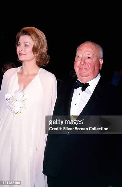 Grace Kelly , US actress, and Alfred Hitchcock , British film director, attending the Film Society Tribute to Alfred Hitchcock, at the Lincoln Cente...
