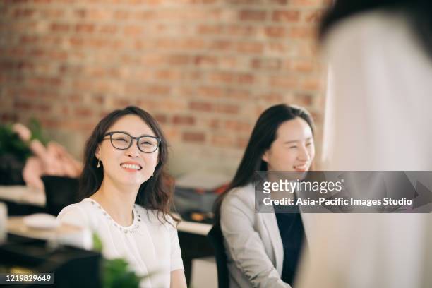 portrait of an asian businesswoman in work. - shanghai people stock pictures, royalty-free photos & images