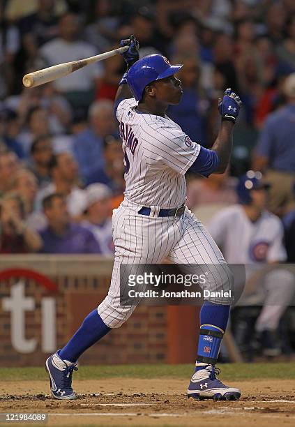 Alfonso Soriano of the Chicago Cubs hits his 22nd home run of the season, a two-run shot in the 2nd inning, against the Atlanta Braves at Wrigley...