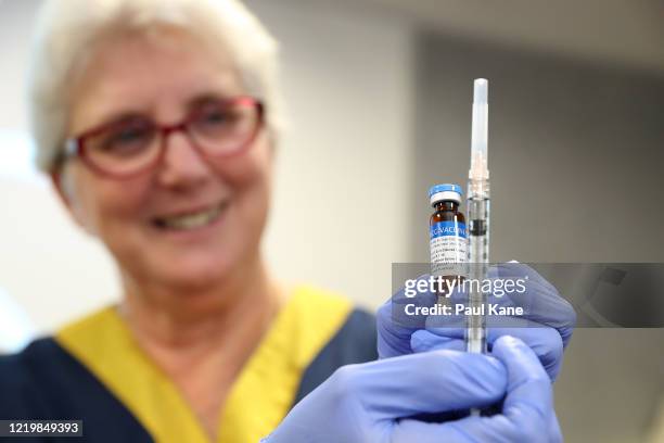 Clinical staff member holds a BCG vial and syringe in the trial clinic at Sir Charles Gairdner hospital on April 20, 2020 in Perth, Australia....