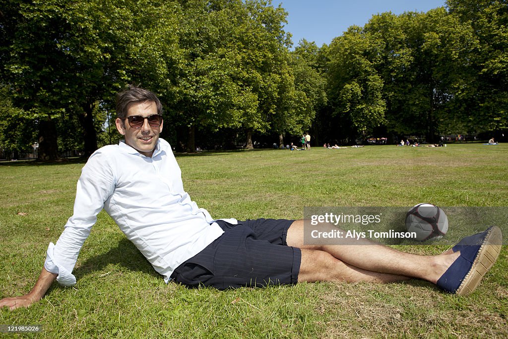 Man Relaxing in a City Park