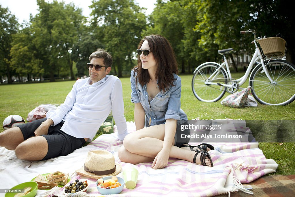 Friends Enjoying a Summer Picnic in the City