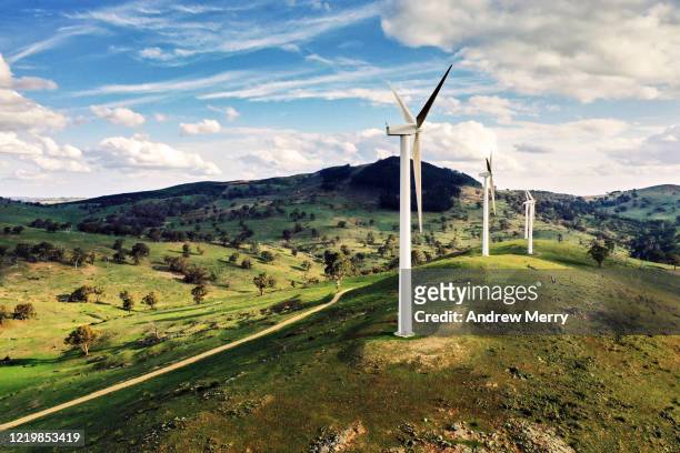wind turbine, wind farm in green field, renewable energy in australia - wind farm australia fotografías e imágenes de stock