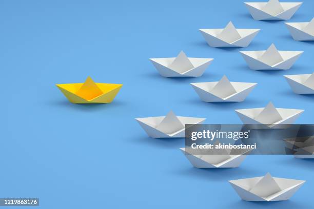 origami paper boat, ship, teamwork and leadership, business concept, - paper boat stock pictures, royalty-free photos & images