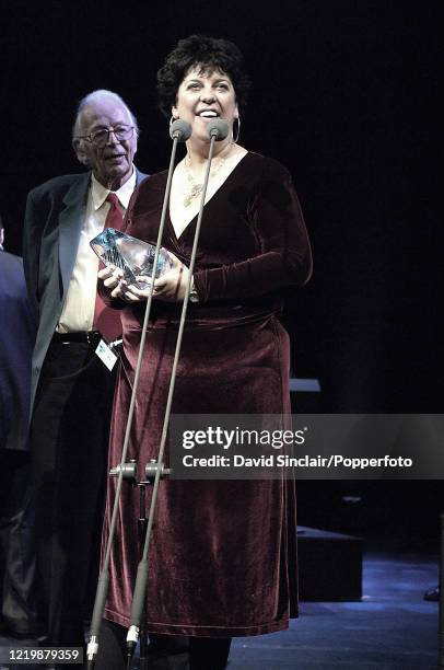 English singer and pianist Liane Carroll is presented with an award on stage during the BBC Jazz Awards at the Mermaid Theatre in London on 2nd July...