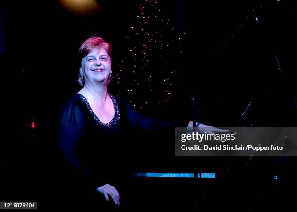 English singer and pianist Liane Carroll performs live on stage at Ronnie Scott's Jazz Club in Soho, London on 29th December 2013.