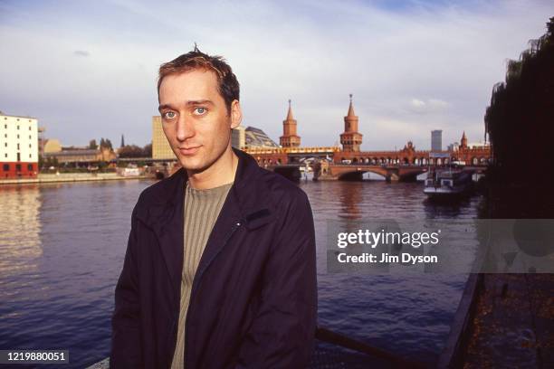 German techno producer Paul van Dyk poses in front of the Oberbaum Bridge over the River Spree in Berlin, circa 2002.