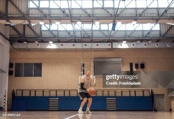 basketball player shooting hoops - hitting stock pictures, royalty-free photos & images