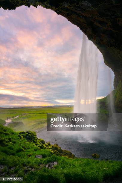 seljalandsfoss with sunset scene in summer. - セリャランスフォス ストックフォトと画像