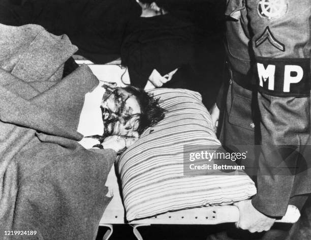 Photo shows the body of Alcatraz prison guard William Miller. He was murdered while concealing a key to a cell block door to prevent Alcatraz...