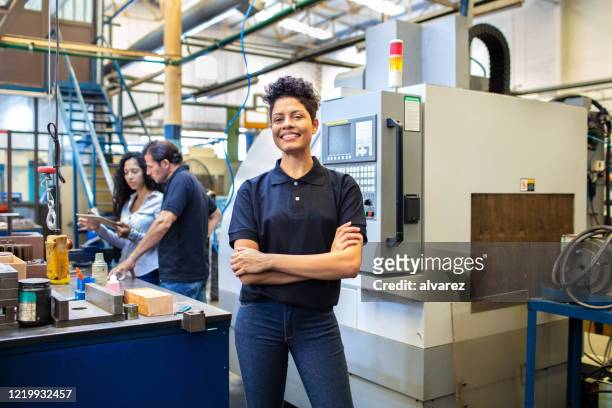 female engineer in a manufacturing company - production line worker stock pictures, royalty-free photos & images