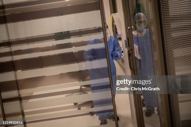 Nurse wearing personal protective equipment works inside the COVID-19 dedicated ICU at the Acibadem Altunizade Hospital on April 16, 2020 in...