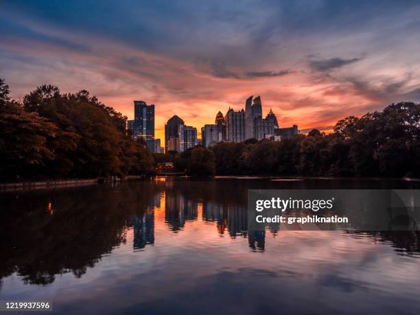 atlanta skyline at dusk - piedmont park atlanta georgia stock pictures, royalty-free photos & images