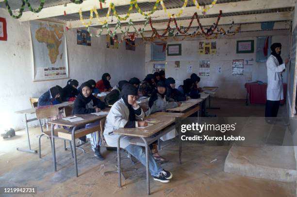 Some Sahrawi refugees are seen in the Tindouf refugee camp on December 05, 1996 in Tinduf, Algeria