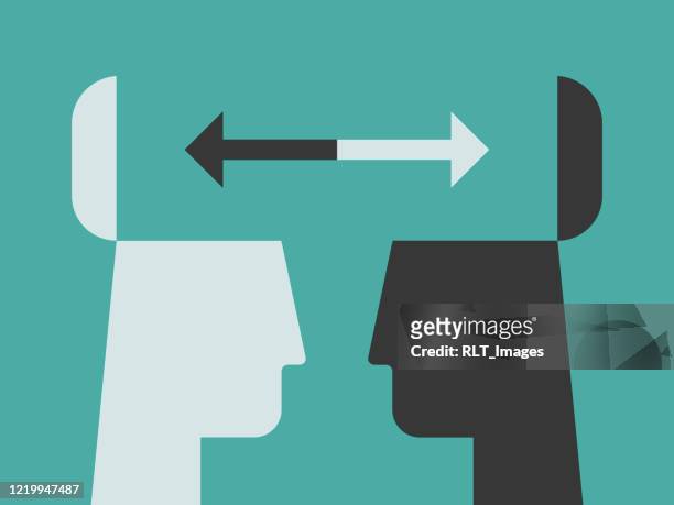 illustration of contrasting head silhouettes exchanging ideas with open minds - human head stock illustrations