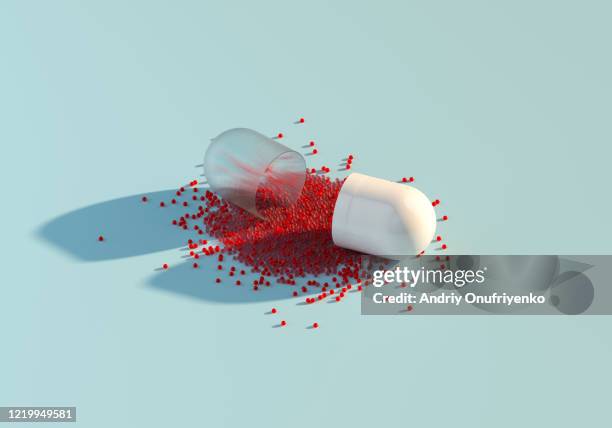 capsule pill - antibiótico fotografías e imágenes de stock